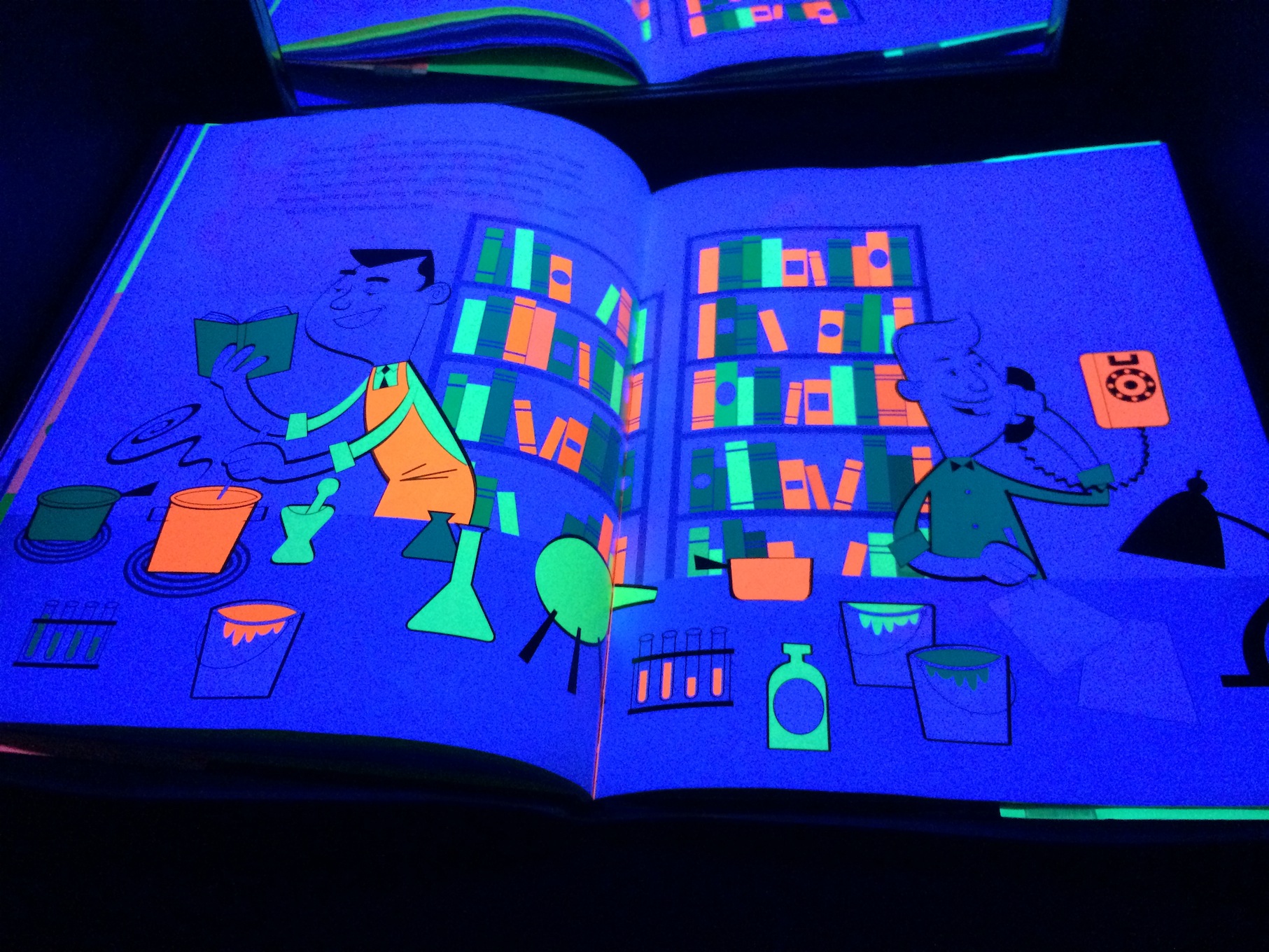 The Day-Glo Brothers - Books for the Black Light - Explore flouresent colors and glow-in-the-dark books in an entirely different light Booth