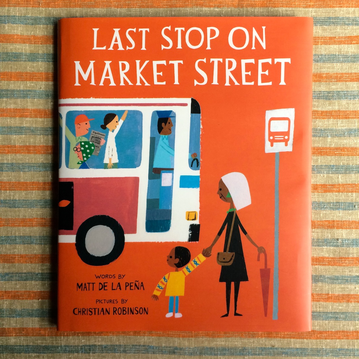 Last Stop on Market Street by Matt De La Pena, pictures by Christian Robinson