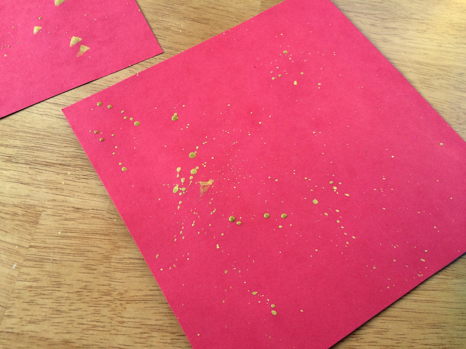 Making Chinese New Year Characters on gold flecked paper