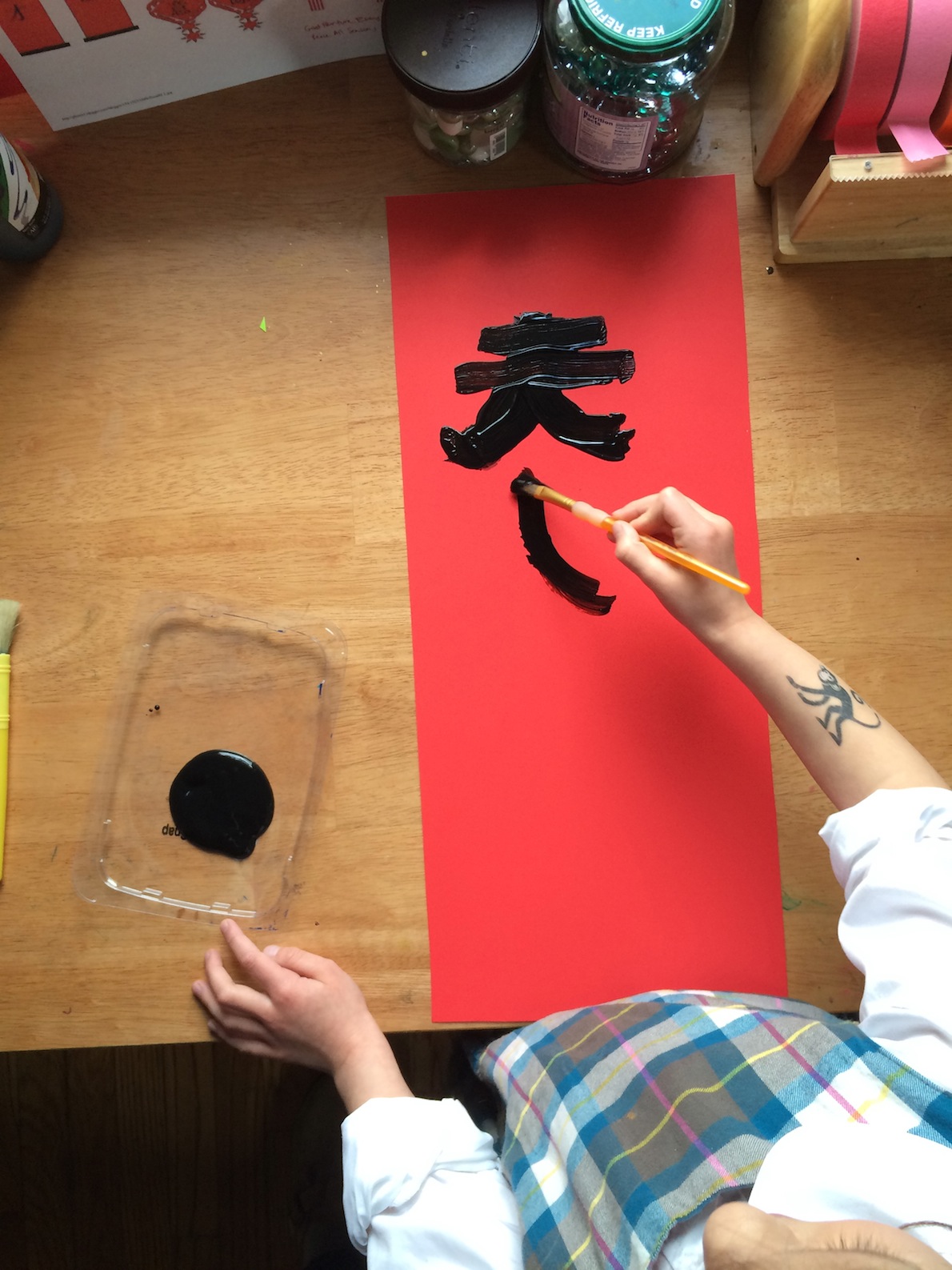 Painting spring couplets for the Lunar New Year